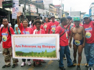 Ａ group of Aytas, indigenous people and survivers of Mt. Pinatubo eruption, joined a parade to cellebrate Fiesta in Olongap City, the Philippines. 